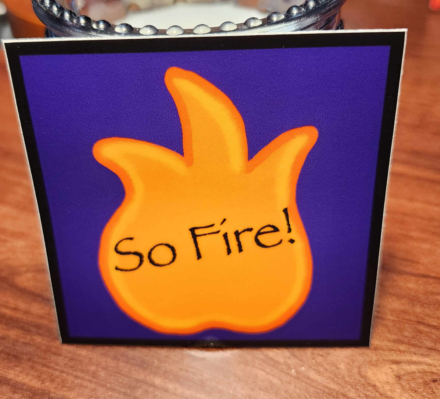 Sticker, "So Fire" Orange Flame on Purple Background, Vinyl, 3 Inch Square
